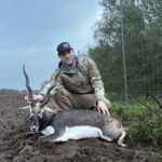 Excited hunter with a prized Blackbuck harvested at El Monte Gringo Ranch