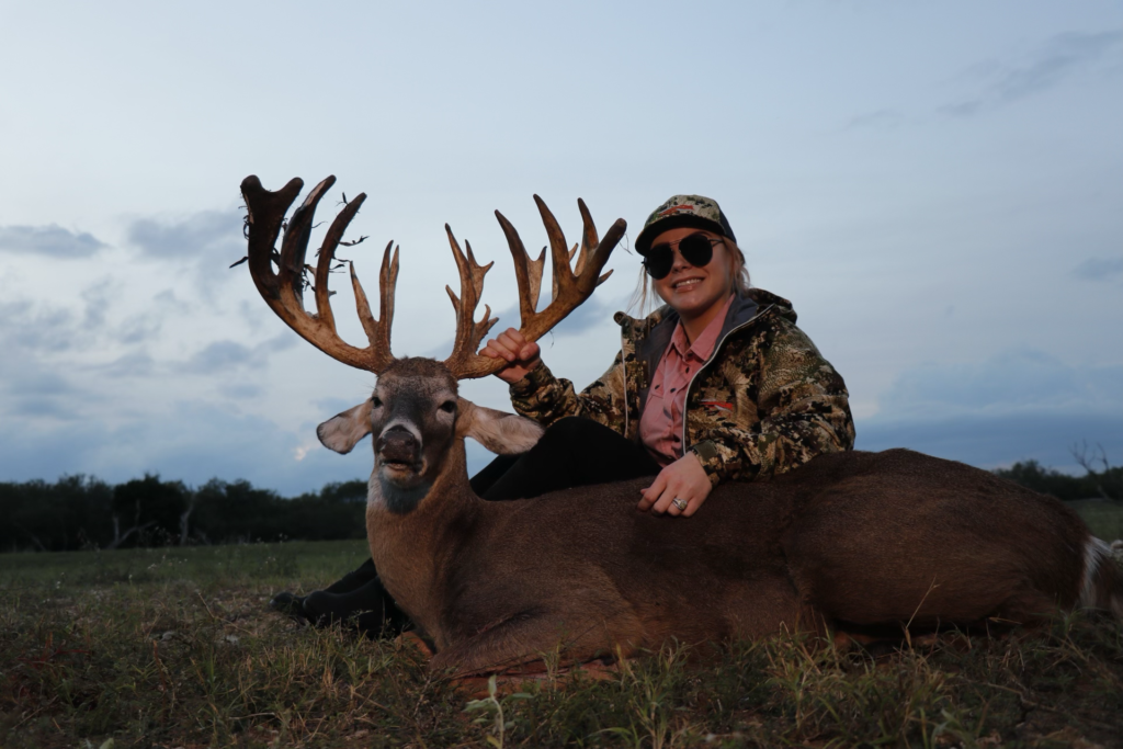 Mayra Vela with a massive 291" Whitetail Deer at El Monte Gringo Ranch